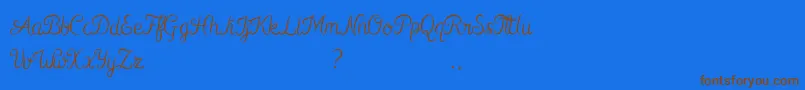 Kurnia Font – Brown Fonts on Blue Background