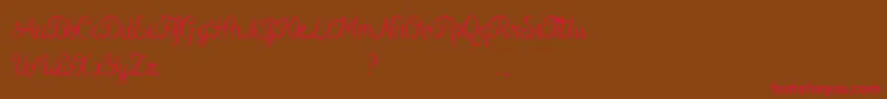 Kurnia-Schriftart – Rote Schriften auf braunem Hintergrund
