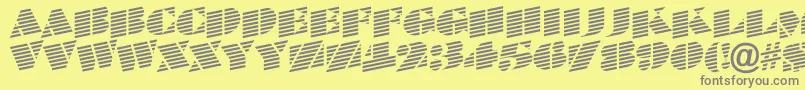 BraggatitulmarupRegular-fontti – harmaat kirjasimet keltaisella taustalla