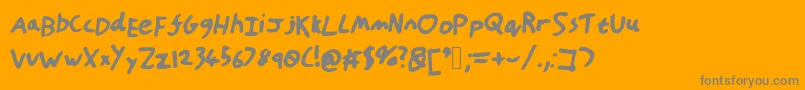 Czcionka HandOfTt – szare czcionki na pomarańczowym tle