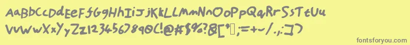 HandOfTt-Schriftart – Graue Schriften auf gelbem Hintergrund