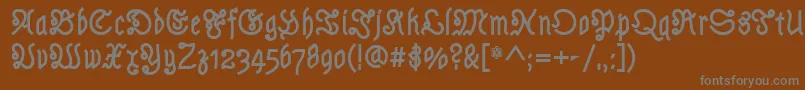 フォントAstlochBold – 茶色の背景に灰色の文字