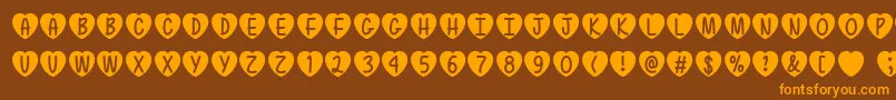 LoveIsAwesomeTtf Font – Orange Fonts on Brown Background