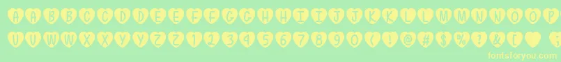 LoveIsAwesomeTtf Font – Yellow Fonts on Green Background