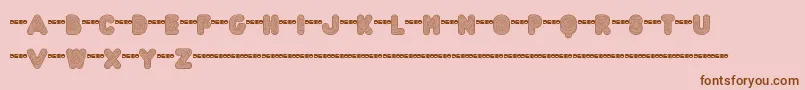 Ftactregdemo-Schriftart – Braune Schriften auf rosa Hintergrund
