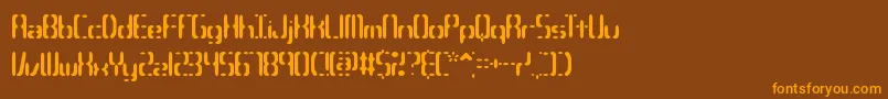 フォントCompc3s – オレンジ色の文字が茶色の背景にあります。