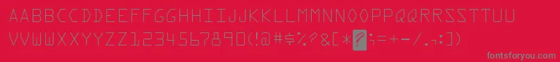 フォントKreditFront – 赤い背景に灰色の文字