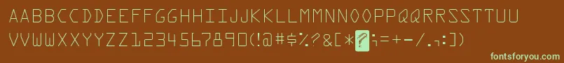 フォントKreditFront – 緑色の文字が茶色の背景にあります。