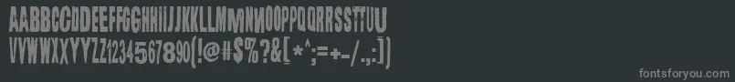 フォントLugosi – 黒い背景に灰色の文字