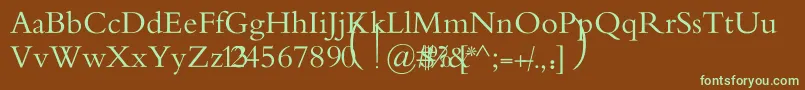 フォントMotkenAlRafidainArt – 緑色の文字が茶色の背景にあります。