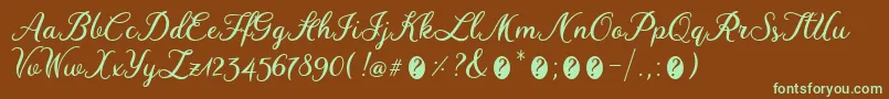 フォントWinedateRegular – 緑色の文字が茶色の背景にあります。