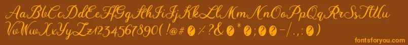 WinedateRegular Font – Orange Fonts on Brown Background