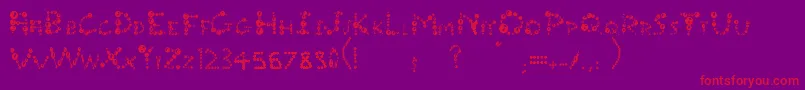 UrCompanysBubblesFantasy-Schriftart – Rote Schriften auf violettem Hintergrund