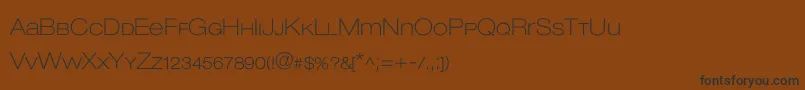 フォントLowvetica – 黒い文字が茶色の背景にあります