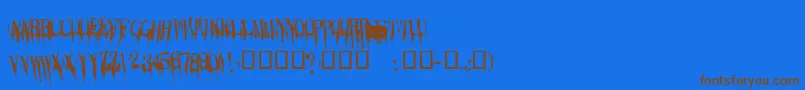 フォントCaracura – 茶色の文字が青い背景にあります。