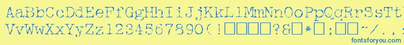 フォントMcgf – 青い文字が黄色の背景にあります。