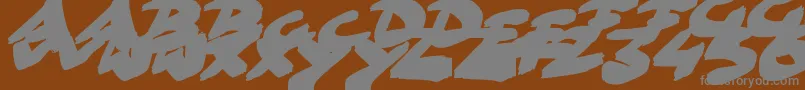 Шрифт GoFasterBrush – серые шрифты на коричневом фоне