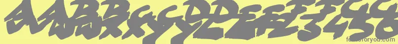 Fonte GoFasterBrush – fontes cinzas em um fundo amarelo