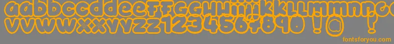 Toyzarux Font – Orange Fonts on Gray Background