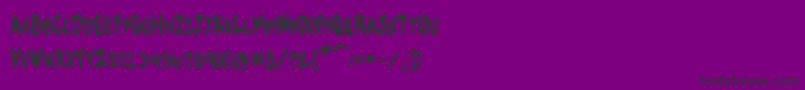 VtcKomikskansTwo-fontti – mustat fontit violetilla taustalla