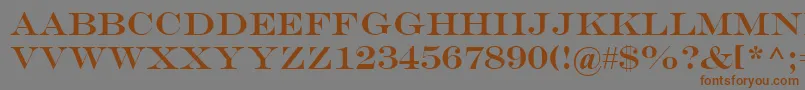 フォントEngraversMt – 茶色の文字が灰色の背景にあります。