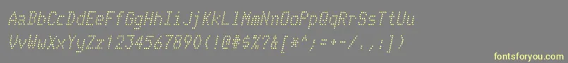 TelidoninkrgItalic-fontti – keltaiset fontit harmaalla taustalla