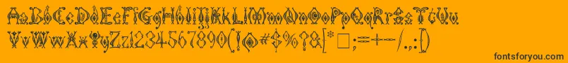 Czcionka KingthingsTendrylle – czarne czcionki na pomarańczowym tle
