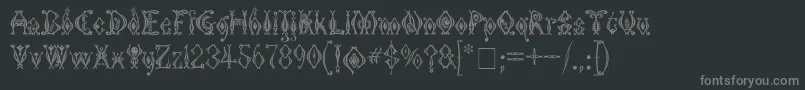 KingthingsTendrylle-fontti – harmaat kirjasimet mustalla taustalla