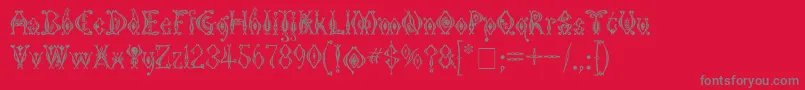 KingthingsTendrylle-fontti – harmaat kirjasimet punaisella taustalla
