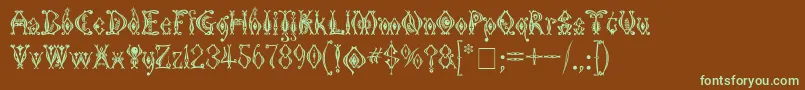 フォントKingthingsTendrylle – 緑色の文字が茶色の背景にあります。