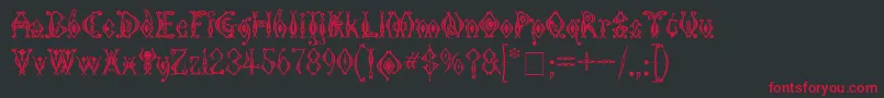 フォントKingthingsTendrylle – 黒い背景に赤い文字