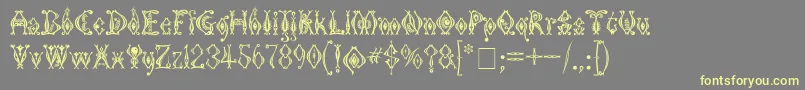 Шрифт KingthingsTendrylle – жёлтые шрифты на сером фоне