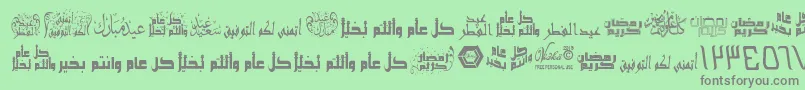 フォントArabicGreetings – 緑の背景に灰色の文字