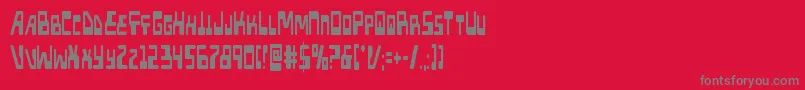 フォントXpedxtracond – 赤い背景に灰色の文字