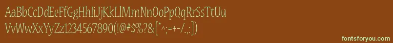 フォントNuevamm – 緑色の文字が茶色の背景にあります。