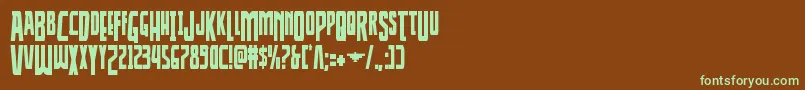 フォントThunderhawkdropcond – 緑色の文字が茶色の背景にあります。