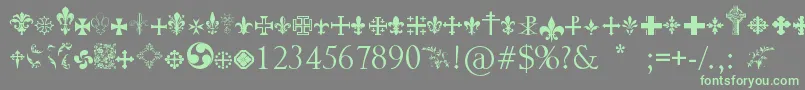 フォントCrucifixsymbols – 灰色の背景に緑のフォント