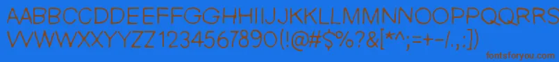 NieZabawneKomik Font – Brown Fonts on Blue Background