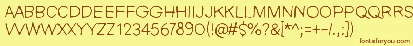 fuente NieZabawneKomik – Fuentes Marrones Sobre Fondo Amarillo