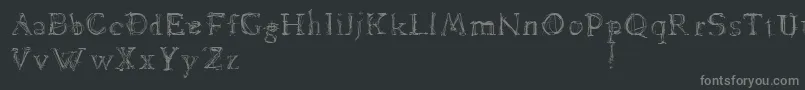 フォントDawnland.Lamenta – 黒い背景に灰色の文字