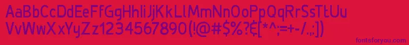 DeLuxeBoldCondensed Font – Purple Fonts on Red Background