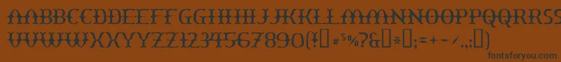 フォントYawnovis – 黒い文字が茶色の背景にあります