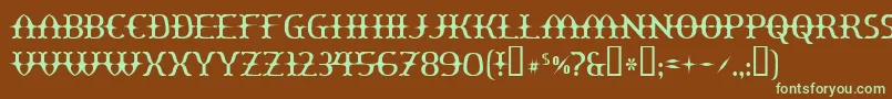 フォントYawnovis – 緑色の文字が茶色の背景にあります。