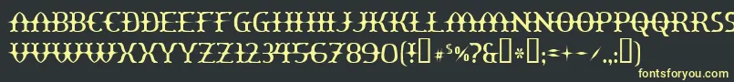 フォントYawnovis – 黒い背景に黄色の文字