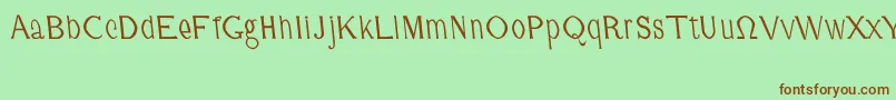 CmFunnyRegular Font – Brown Fonts on Green Background