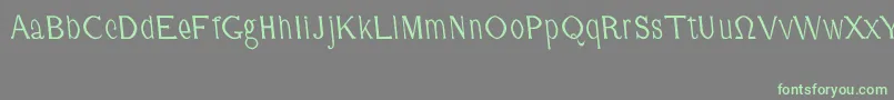 CmFunnyRegular Font – Green Fonts on Gray Background