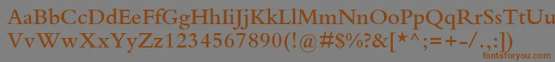 フォントKuriakosSsiSemiBold – 茶色の文字が灰色の背景にあります。