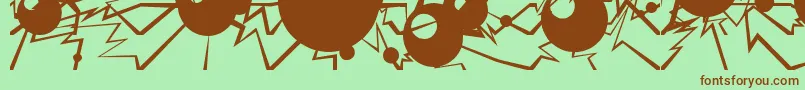 Więcej informacji o czcionce Electricsphere Czcionka Electricsphere – brązowe czcionki na zielonym tle