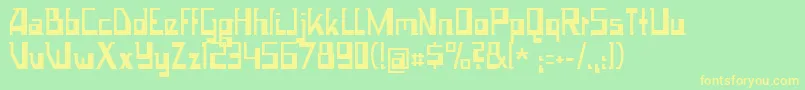 フォントSpace Worm – 黄色の文字が緑の背景にあります