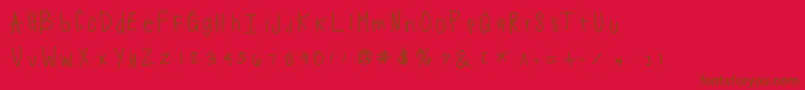 フォントSuji – 赤い背景に茶色の文字